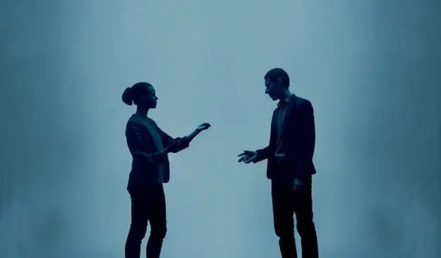 Two people communicating - Visit our language lab for more guides