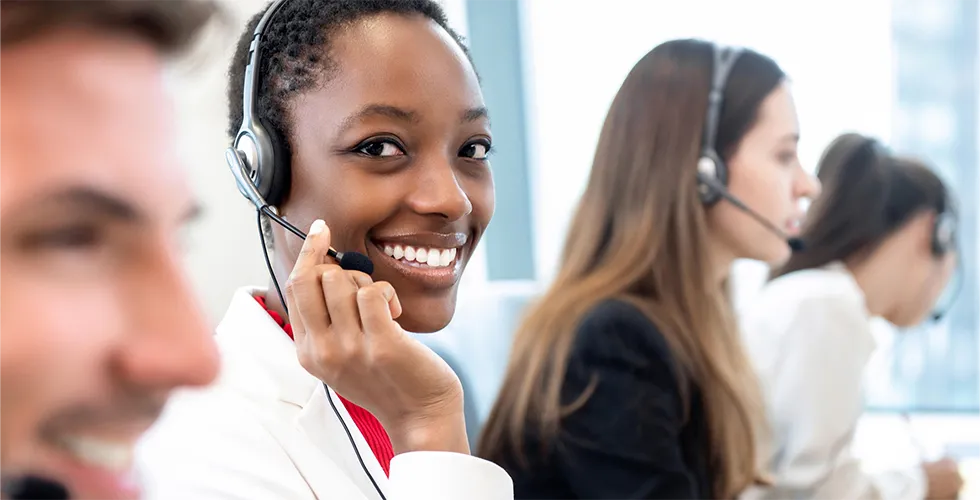 A service employee helps with an order for a Portuguese translation